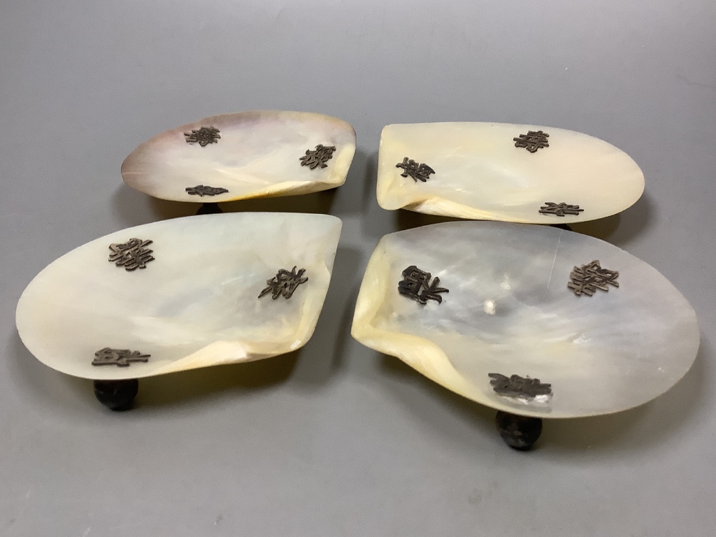 A set of four Chinese mother of pearl dishes, approx. length 11.5cm